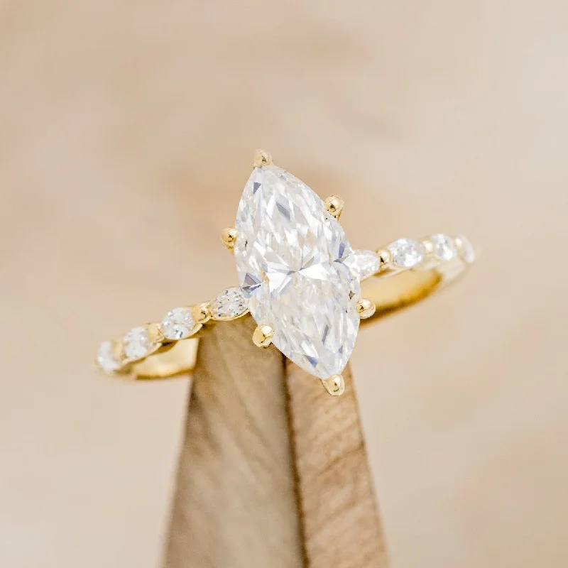 "ROMY" - MARQUISE CUT MOISSANITE ENGAGEMENT RING WITH DIAMOND ACCENTS