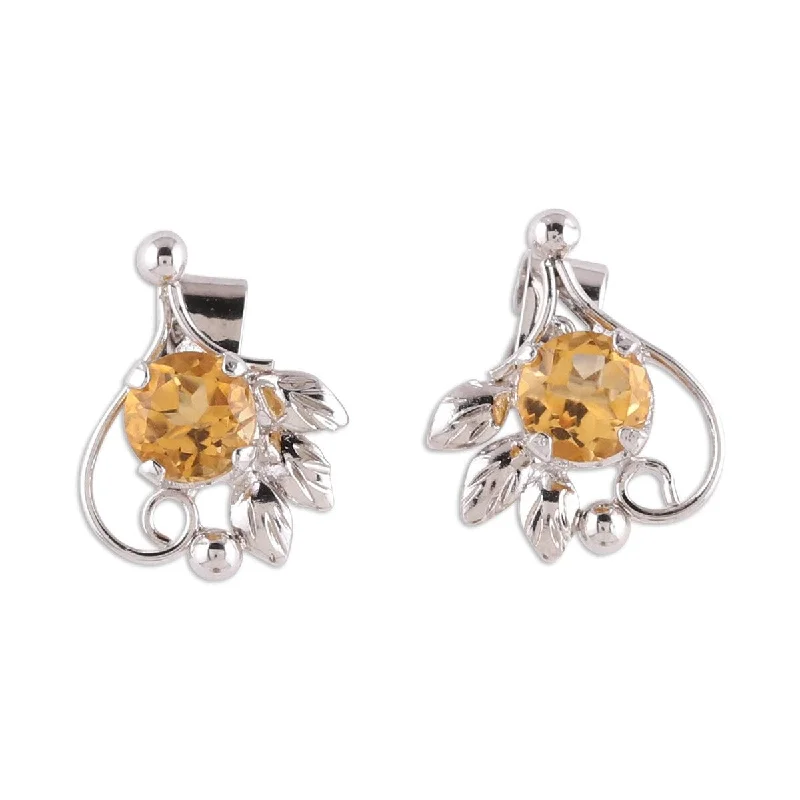 NOVICA Sunny Leaves, Rhodium plated citrine stud earrings - 0.6*0.5